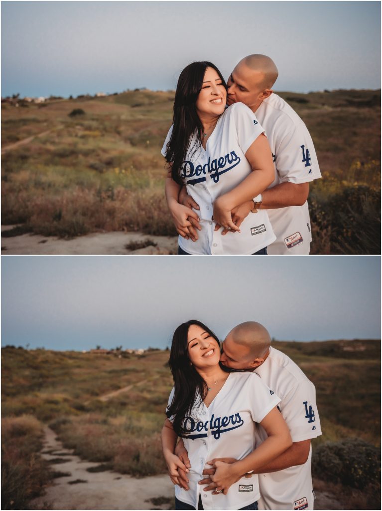 Couple at sunset at Sycamore Canyon Wilderness Park in Riverside, CA wearing dodger jerseys for engagement photos