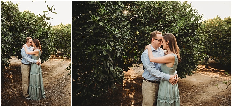couple in orange groves at California Citrus State Historic Park in Riverside, CA by Dallas Wedding Photographer for their engagement session 