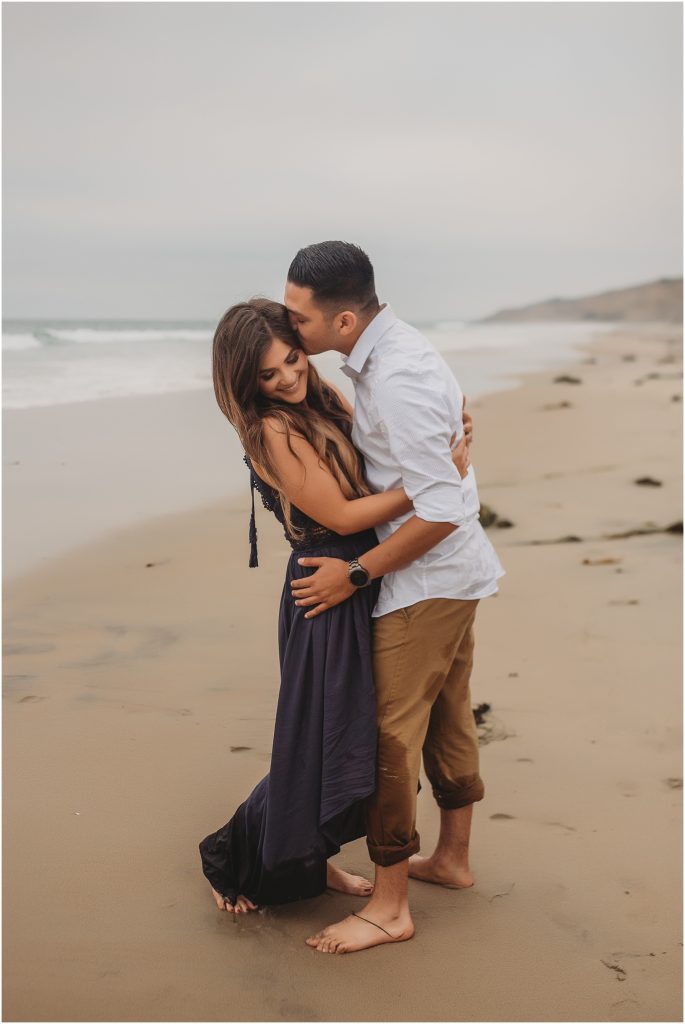 Intimate San Diego beach engagement session at Blacks Beach in La Jolla, CA by Dallas Wedding Photographer