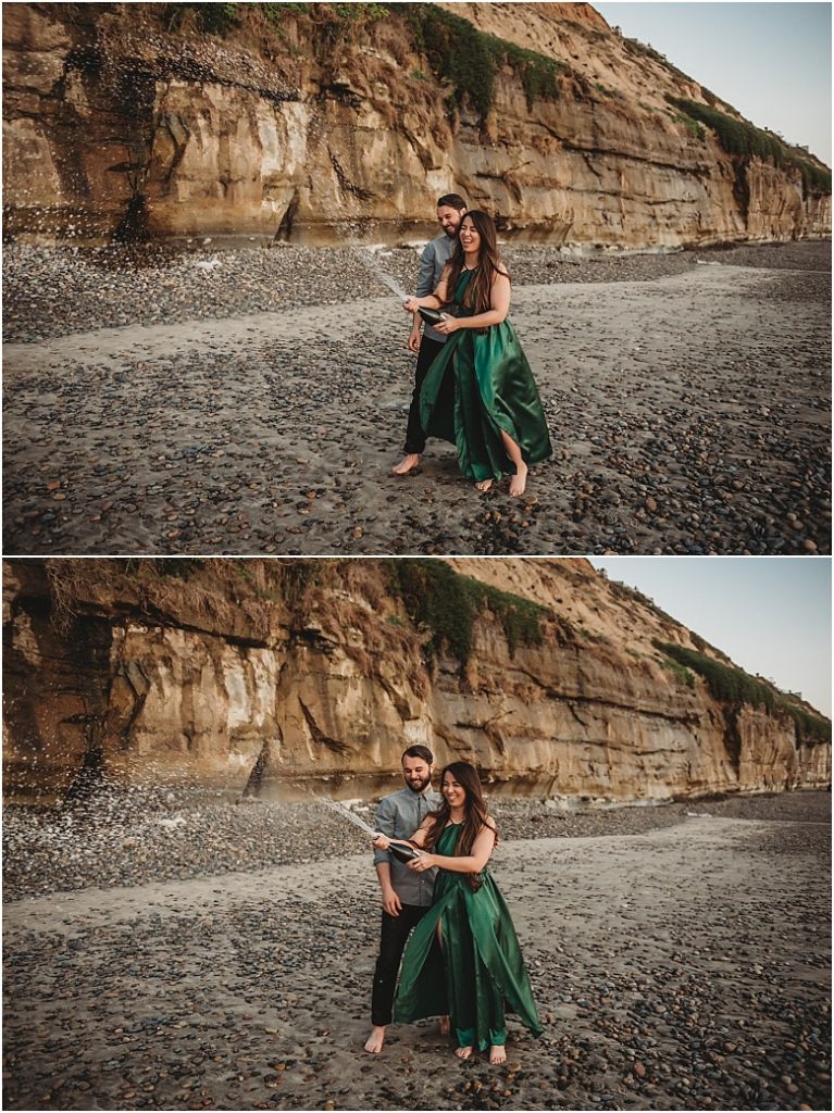 June and Christian beach engagement session in Encinitas, Ca champagne pop during beach engagement session in Encinitas, Ca