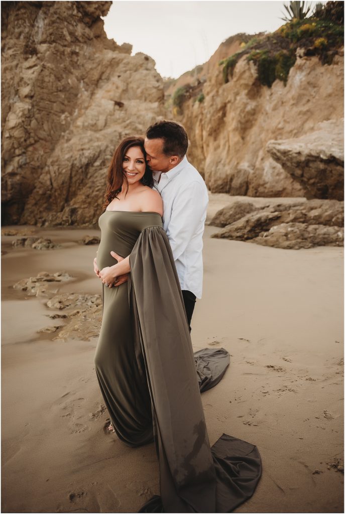 Maternity photos at El Matador Beach in Malibu, CA during sunset