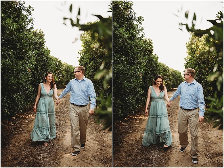 couple in orange groves at California Citrus State Historic Park in Riverside, CA by Dallas Wedding Photographer for their engagement session 
