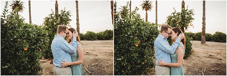 couple in orange groves at California Citrus State Historic Park in Riverside, CA by Dallas Wedding Photographer for their engagement session 