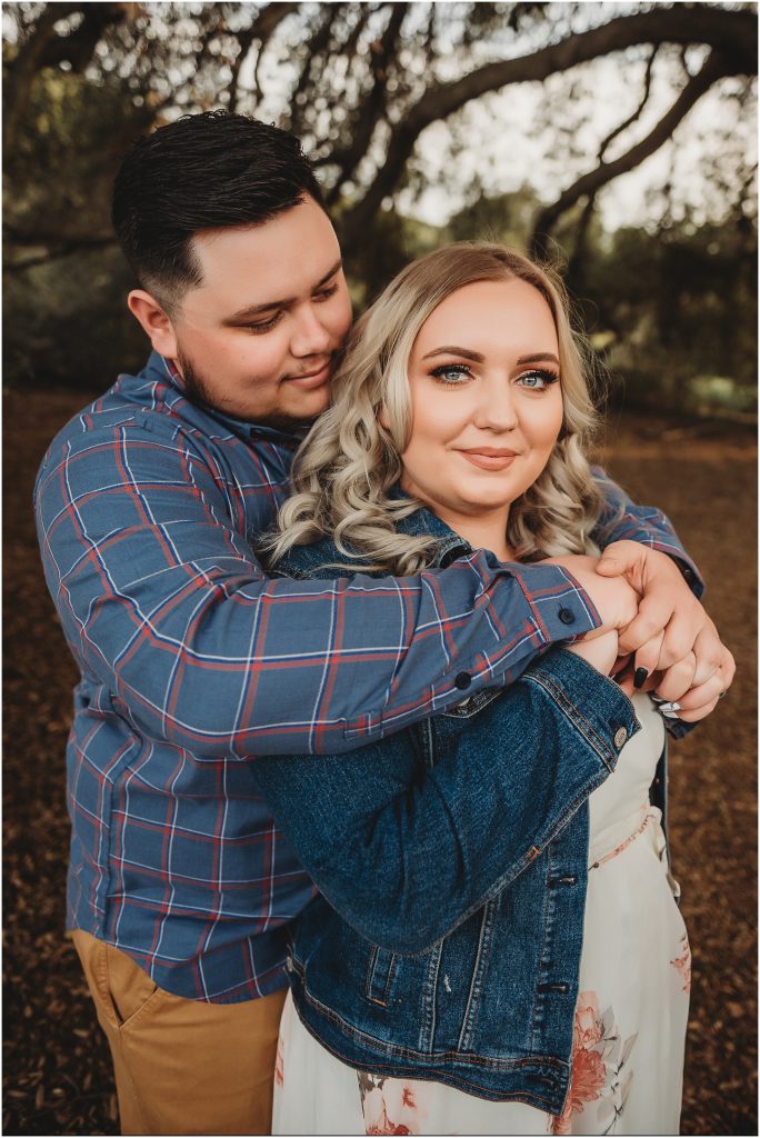 couple at Owl Creek Farms Foundation a Temecula wedding venue for their engagement session during sunset