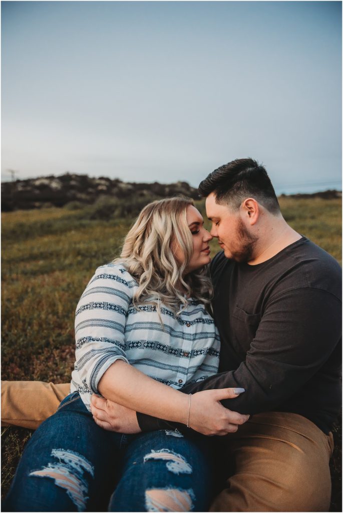couple at Owl Creek Farms Foundation a Temecula wedding venue for their engagement session during sunset