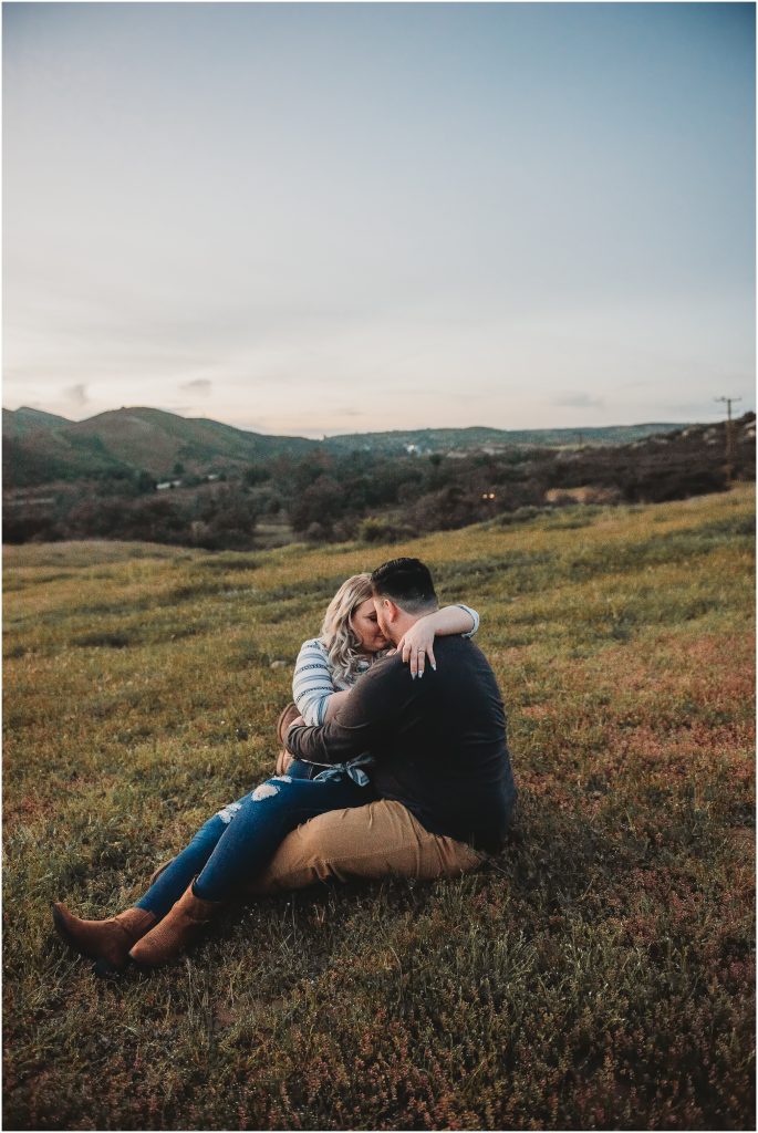 couple at Owl Creek Farms Foundation a Temecula wedding venue for their engagement session during sunset