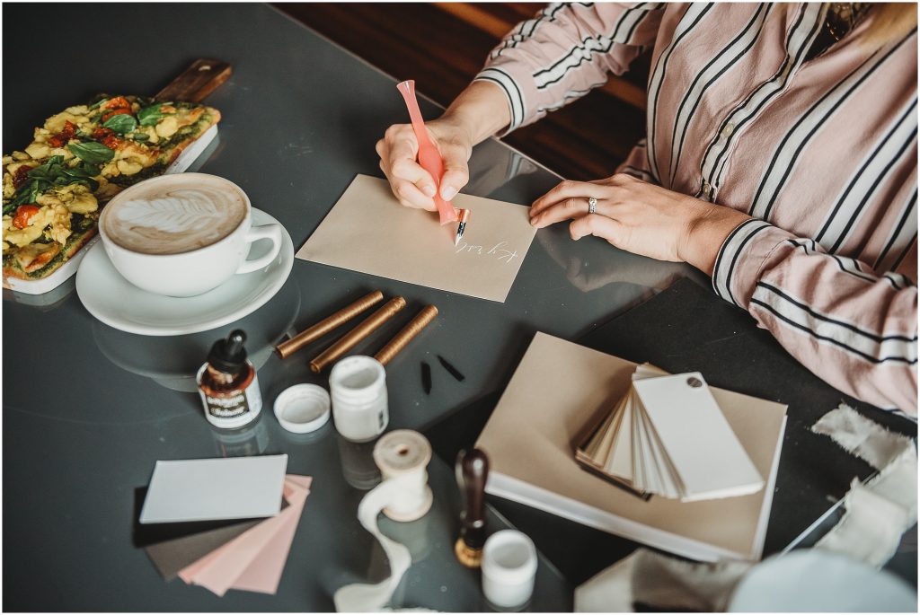 calligrapher Something Lettered addressing wedding envelopes for wedding invitation suite