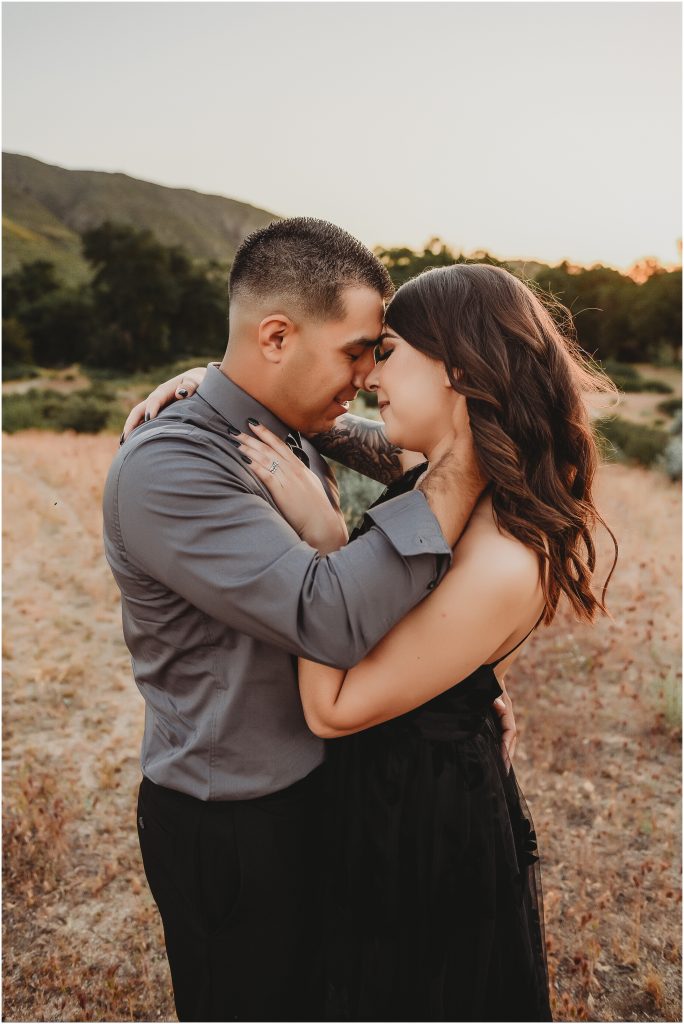 Temecula and Dallas Wedding Photographer -- couple during anniversary photoshoot in Temecula, CA in a field