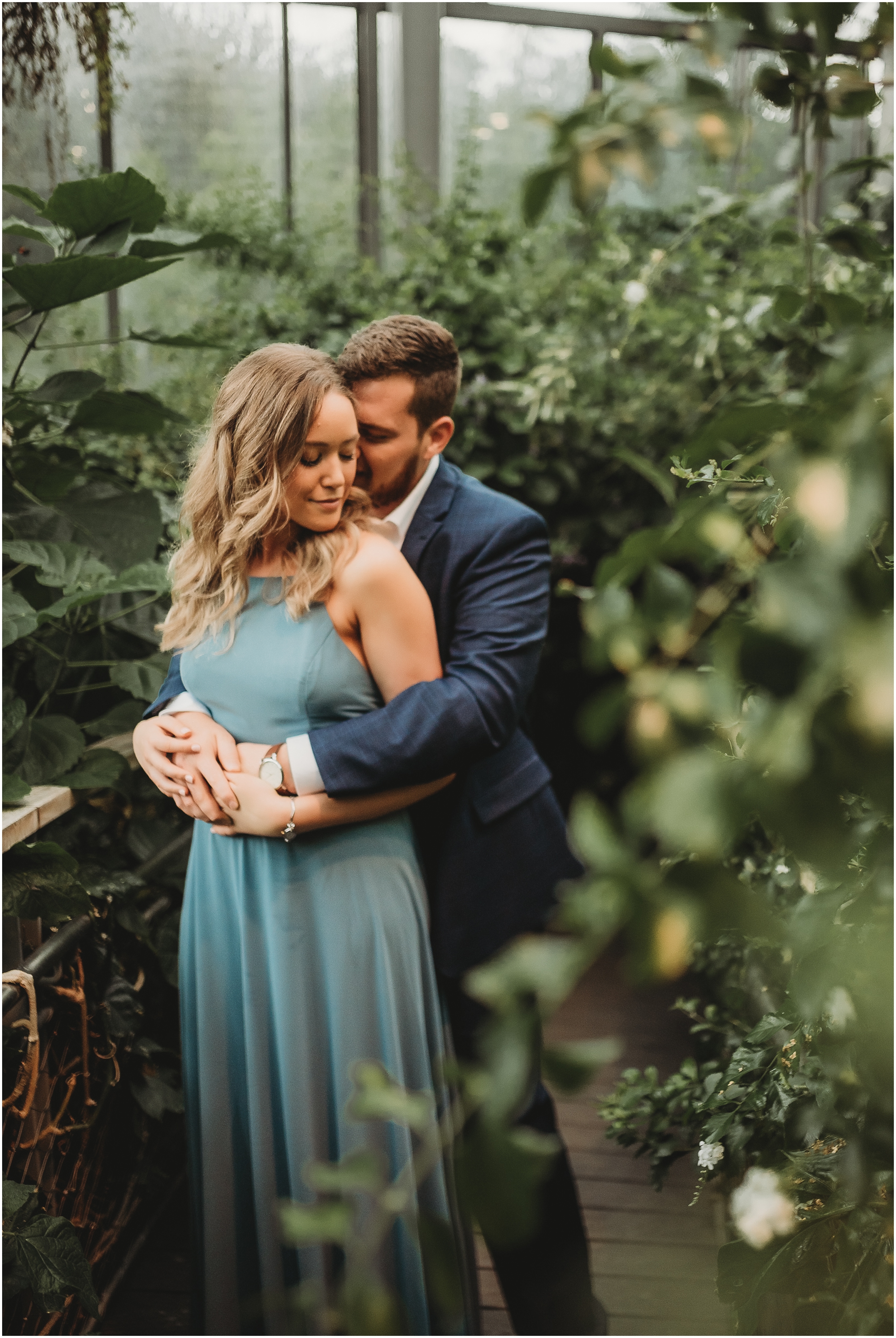 Engagement session in the Butterfly House in the Texas Discovery Gardens in Dallas, Texas by Dallas Wedding Photographer