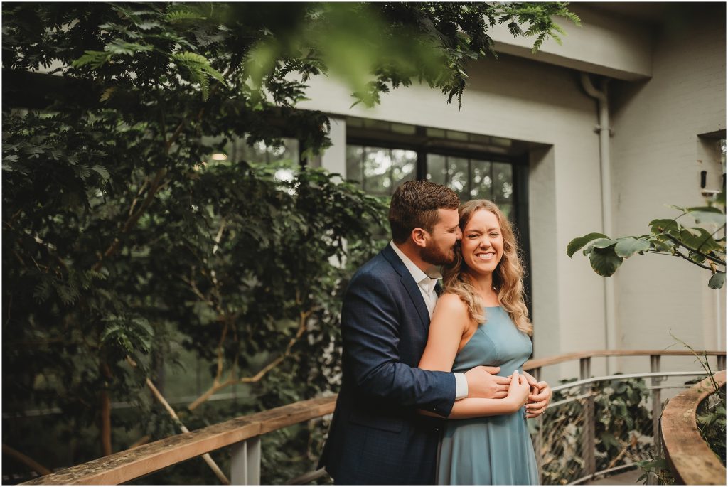 Engagement session in the Butterfly House in the Texas Discovery Gardens in Dallas, Texas by Dallas Wedding Photographer