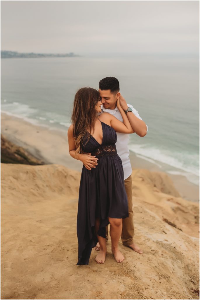 Intimate San Diego beach engagement session at Blacks Beach in La Jolla, CA by Dallas Wedding Photographer