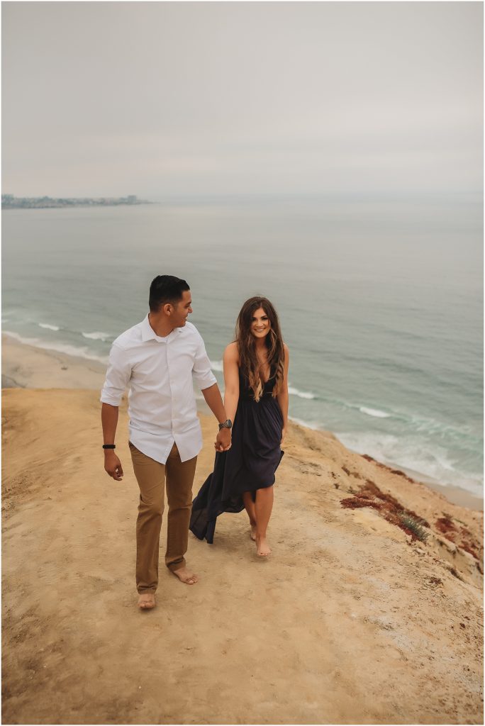 Intimate San Diego beach engagement session at Blacks Beach in La Jolla, CA by Dallas Wedding Photographer