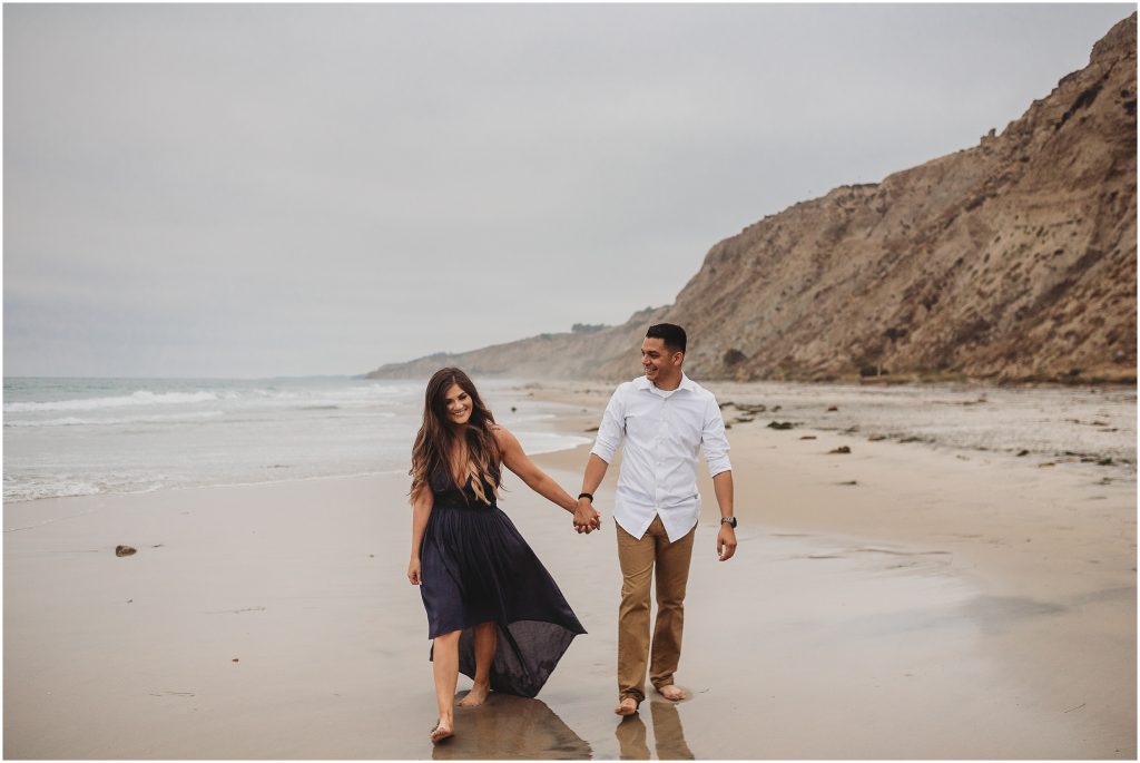 Intimate San Diego beach engagement session at Blacks Beach in La Jolla, CA by Dallas Wedding Photographer