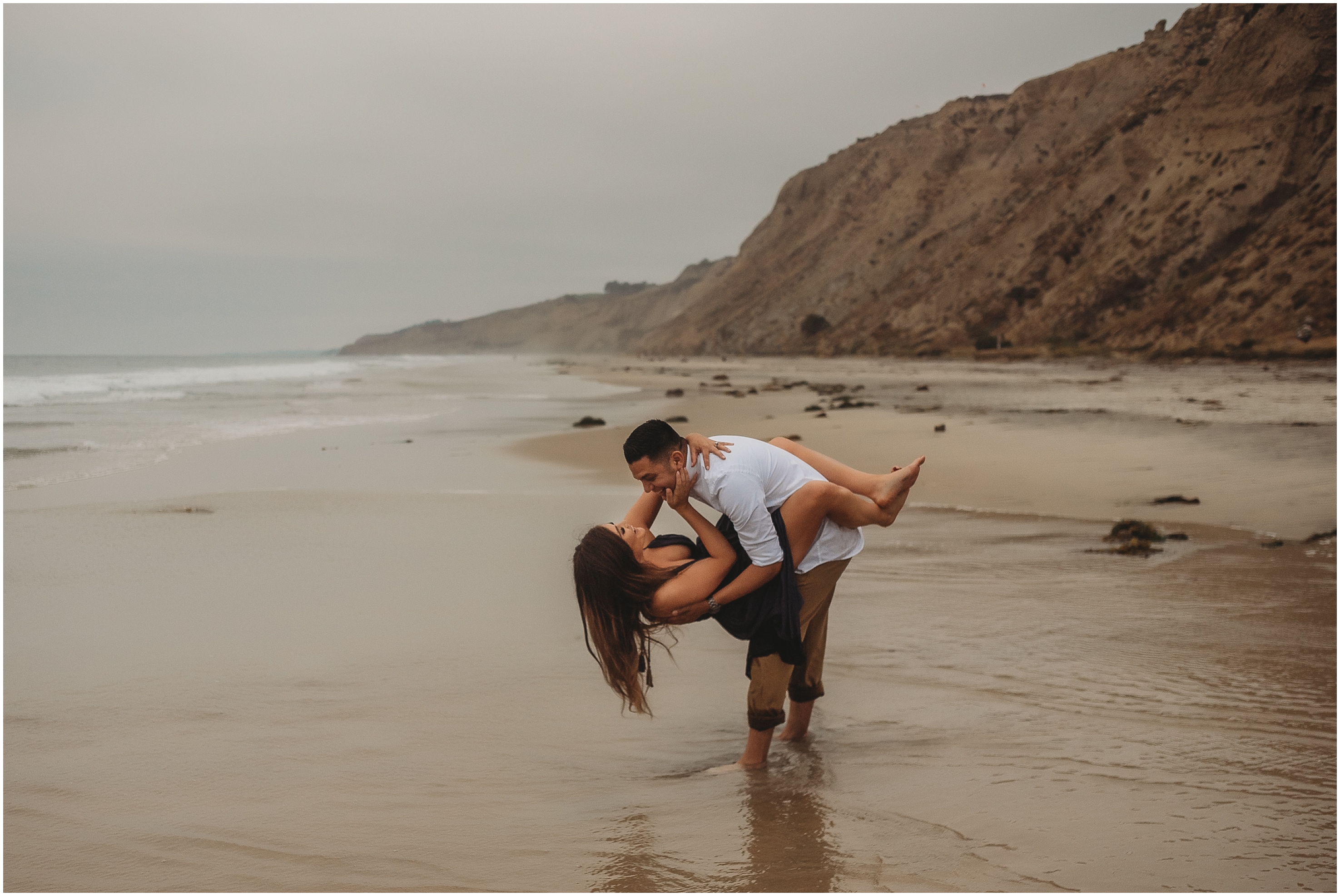 Intimate San Diego beach engagement session at Blacks Beach in La Jolla, CA by Dallas Wedding Photographer