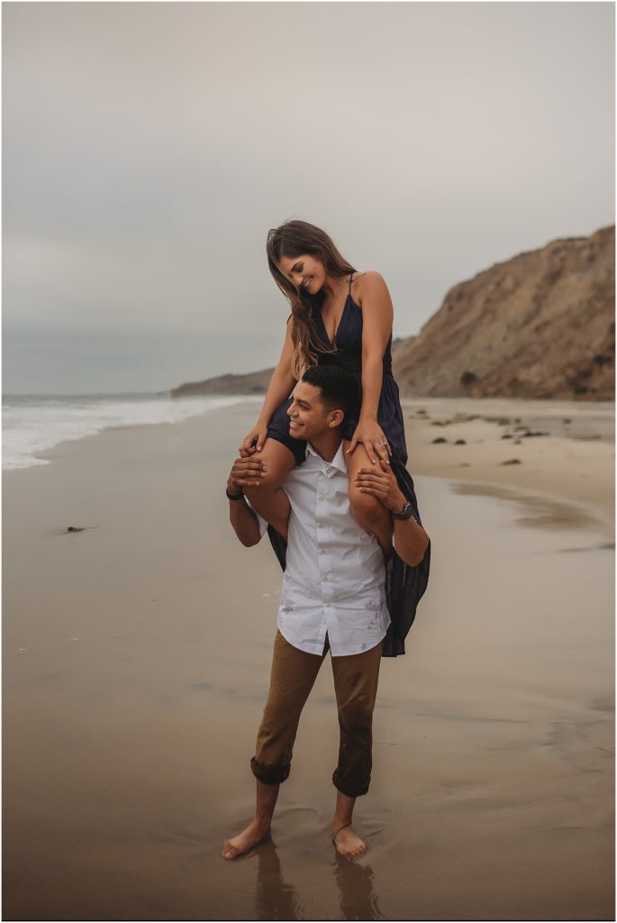 Intimate San Diego beach engagement session at Blacks Beach in La Jolla, CA by Dallas Wedding Photographer