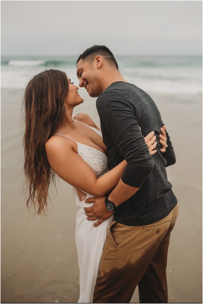 Intimate San Diego beach engagement session at Blacks Beach in La Jolla, CA by Dallas Wedding Photographer