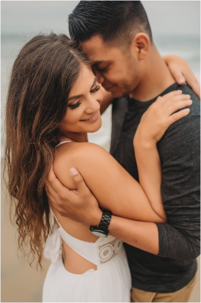 Intimate San Diego beach engagement session at Blacks Beach in La Jolla, CA by Dallas Wedding Photographer