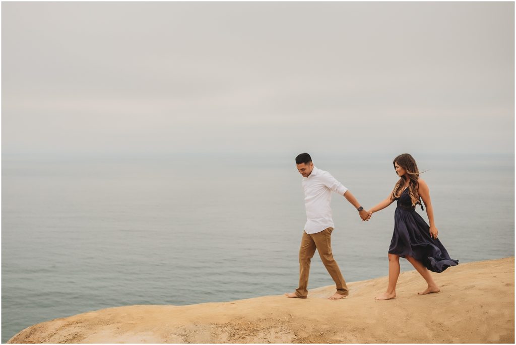 Intimate San Diego beach engagement session at Blacks Beach in La Jolla, CA by Dallas Wedding Photographer