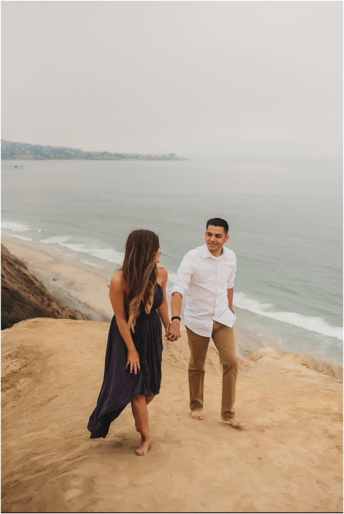 Intimate San Diego beach engagement session at Blacks Beach in La Jolla, CA by Dallas Wedding Photographer