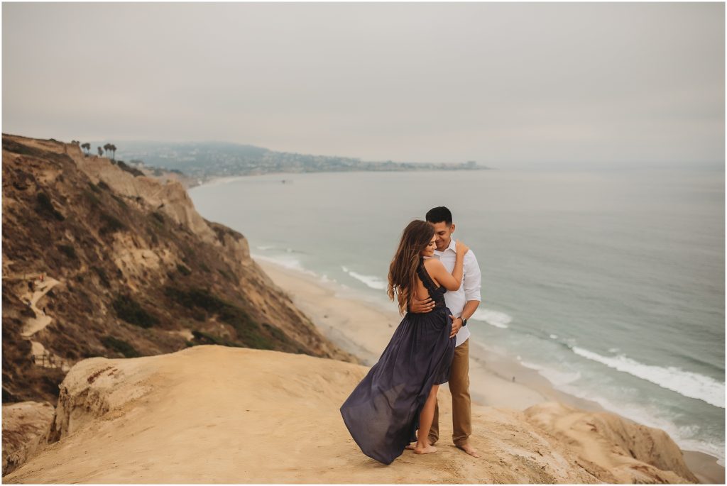 Intimate San Diego beach engagement session at Blacks Beach in La Jolla, CA by Dallas Wedding Photographer