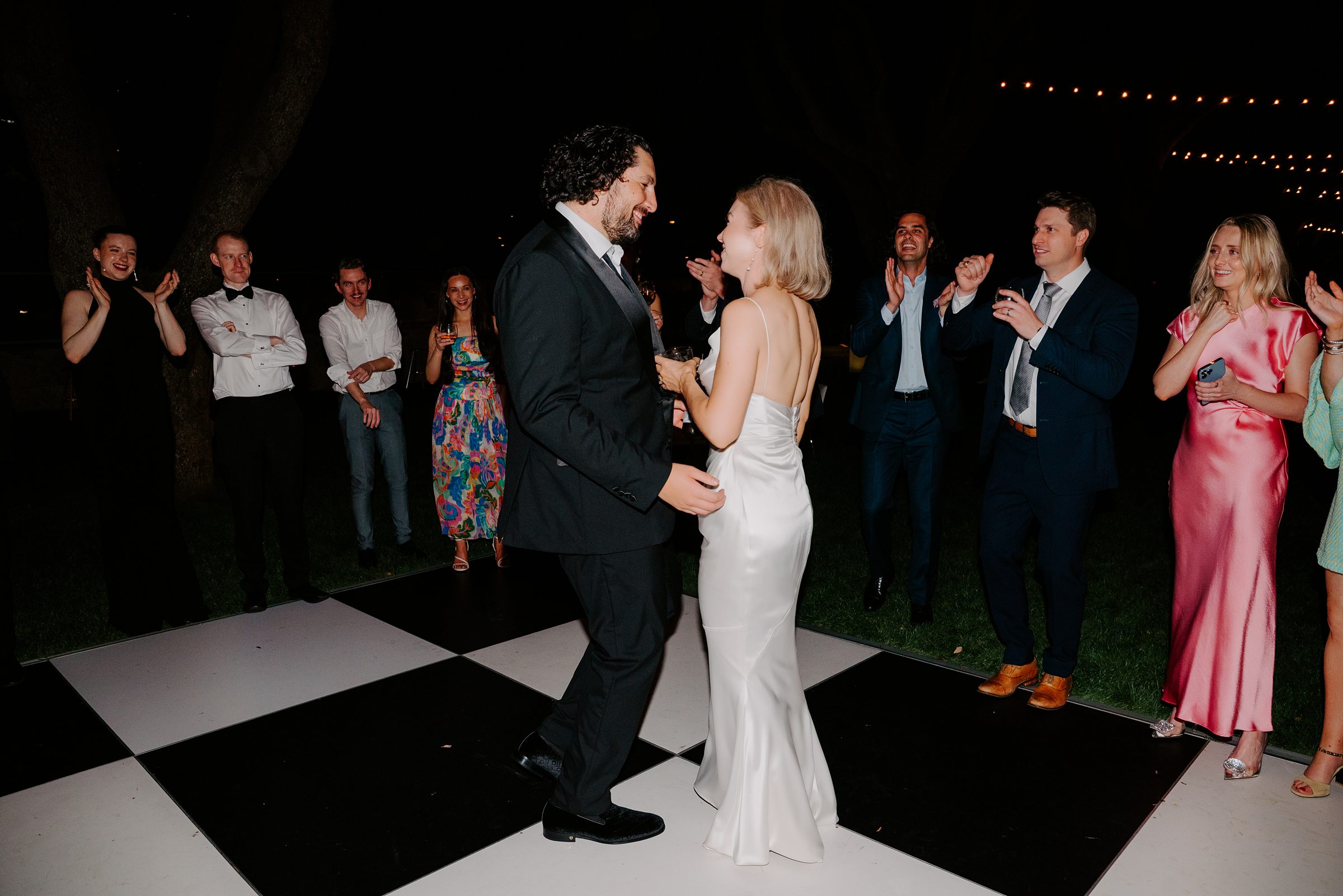 Evening wedding reception at the Nasher Sculpture Center with guests celebrating