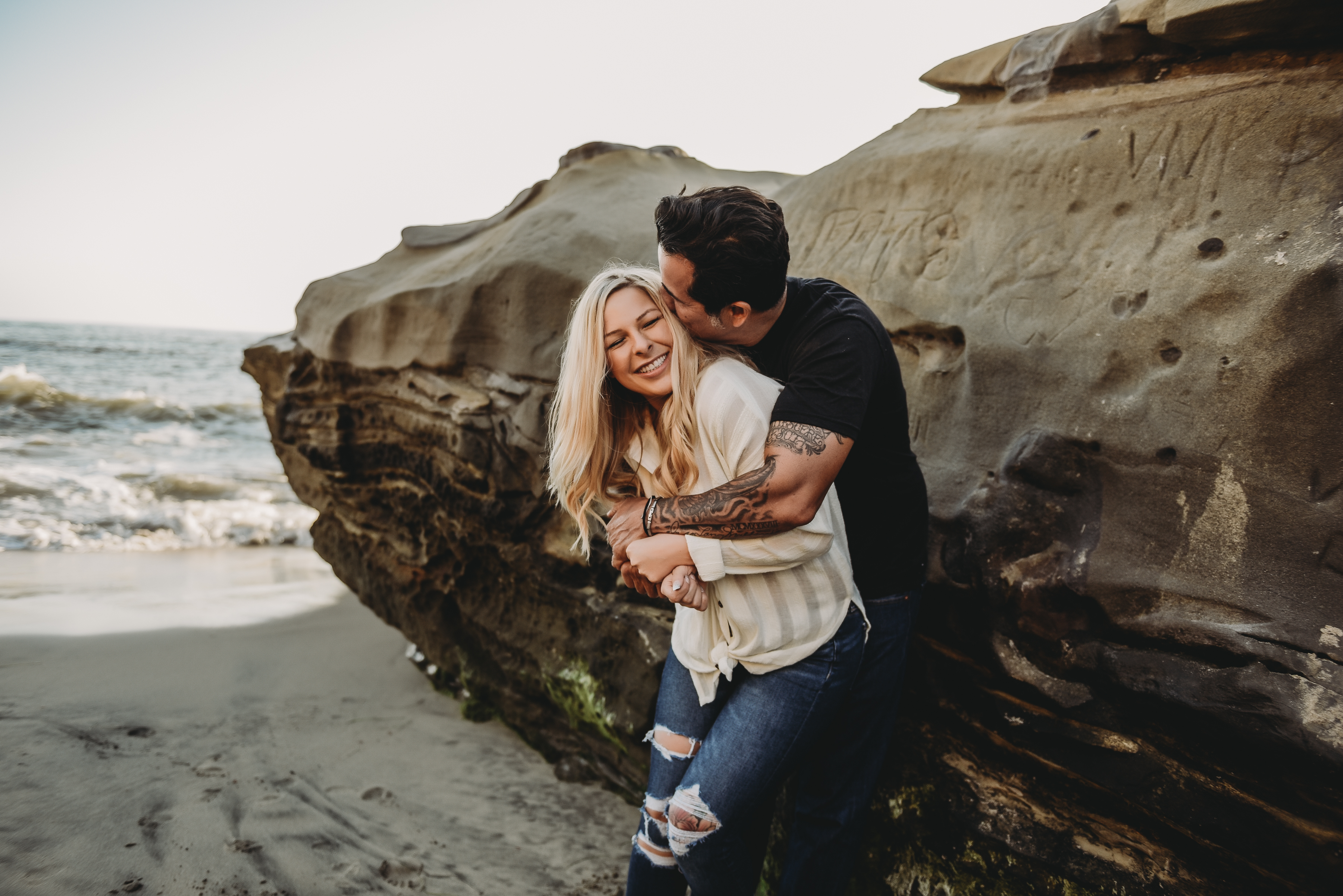 playful engagement photos at Sunset Cliffs in San Diego by Dallas Wedding Photographer